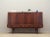 The highboard was made in the 1960s, Danish production. The structure is covered with rosewood veneer. The legs are made...
