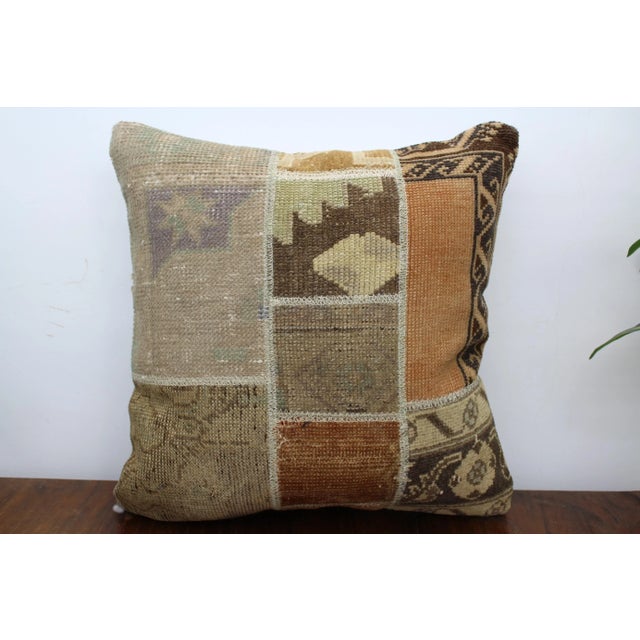 This Turkish pillow cover is made from the highest quality vintage rug in 100% wool on the front. The back is covered in...