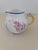 Add this small pitcher to your Quimper collection. It can be used separately for other needs. Use the creamer to hold...