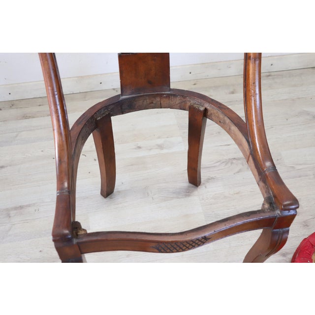 Beautiful 19th century of the period Charles X Italian set of 2 chairs antique in solid walnut wood. Characterized by an...