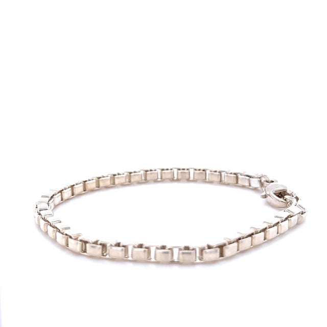 A classic Tiffany & Co. Venetian bracelet crafted in sterling silver, featuring the collection's distinctive square link...