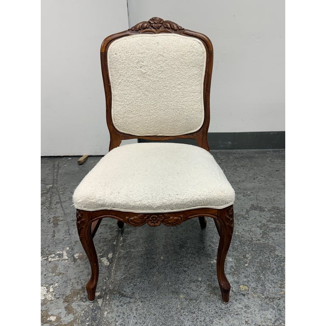 Design Plus Gallery presents a Vintage French Louis XV Style Side Chair. The carved wood frame displays a floral crest,...