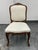Design Plus Gallery presents a Vintage French Louis XV Style Side Chair. The carved wood frame displays a floral crest,...