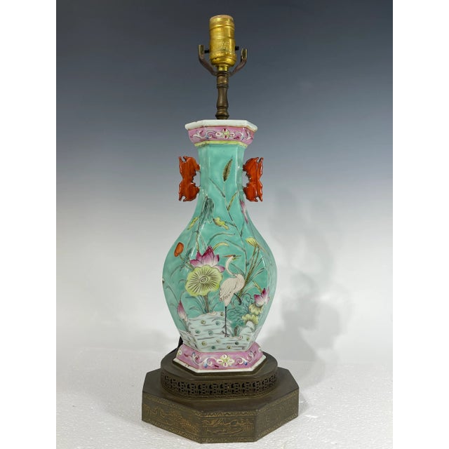 19th century Chinese porcelain vase turned to a lamp in the middle of century. Very beautiful hand painted with a white...