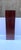 A rich brown stained oak wood pedestal column stand, Midcentury Modern Design period, circa mid‑20th century. The piece...