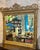 This 46.5 by 27-inch antique gilded mantel mirror combines artisanal craftsmanship with timeless elegance. Featuring a...
