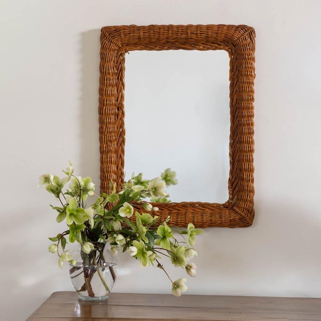 Lovely rectangular mirror from France, 1960s. Original wicker and mirror with nice coloring and patina. Perfect size for...