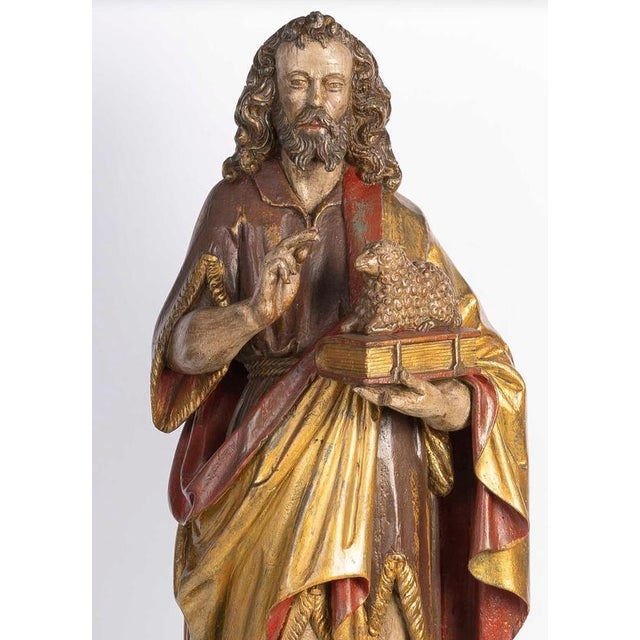 Polychrome carved wooden sculpture from the late 16th century, Germany. Sculpture depicting Saint John the Baptist, made...