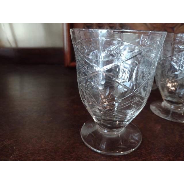 Offered is a beautiful set of 8 rock crystal parfait / juice glasses from the 1920's. They stand 4 1/4" tall and are 3" in...