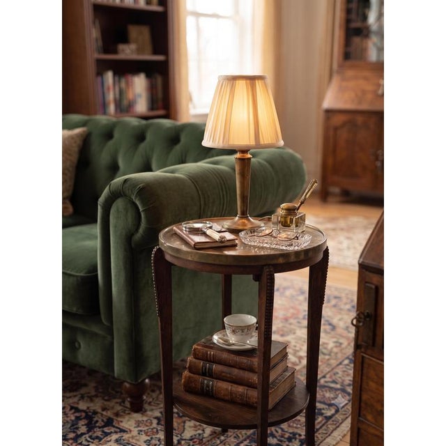 An elegant Austrian/Central European Vienna Secession geometric oak side table or gueridon, dating from around 1910. This...