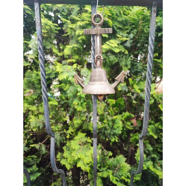Brass anchor hanger with bell, vintage from the 1970s, dimensions: height 24 cm, width 14 cm, depth 15 cm, diameter 7 cm.