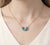 Celebrate timeless elegance with this beautifully crafted double pear gemstone necklace, designed to symbolize connection,...