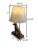 Charming golden retriever sculpture lamp with golden finish on wooden base. Dog lovers will adore its character....