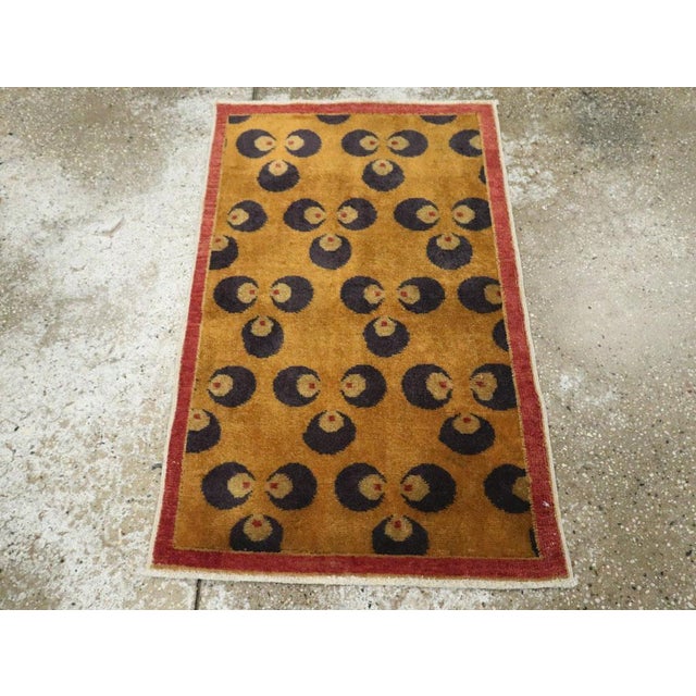 This Mid-20th century Turkish Art Deco throw rug, measuring 2' 0" x 3' 0", is a striking example of modernist design...