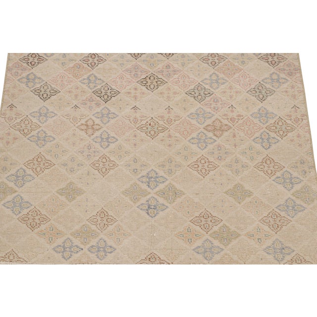 This vintage 3x4 rug is an exciting new addition to Rug & Kilim’s Mid-Century Pasha Collection. This line is a...