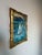 A framed mid-century expressionist - style abstract oil on canvas harbor/cityscape painting. Depicting a boat in the sea...