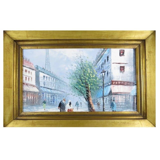 A fine antique French oil on canvas of a Parisian street scene. Stunning vibrant colors with people, tree, and the Eiffel...