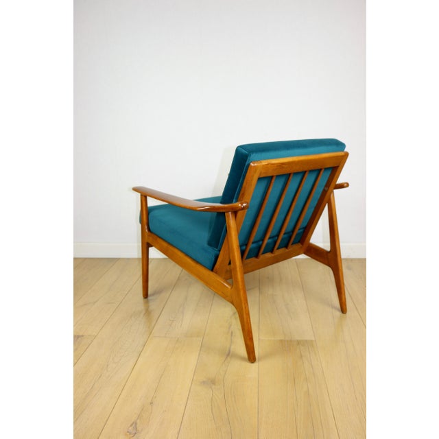 Danish vintage loft armchair in sea green with removable cushions. A beautiful, original Danish vintage armchair from the...