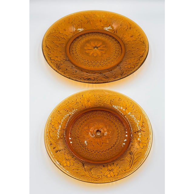 Timeless elegance of this stunning vintage Indiana Glass Tiara Amber 2-Tier serving tray! This exquisite piece showcases...