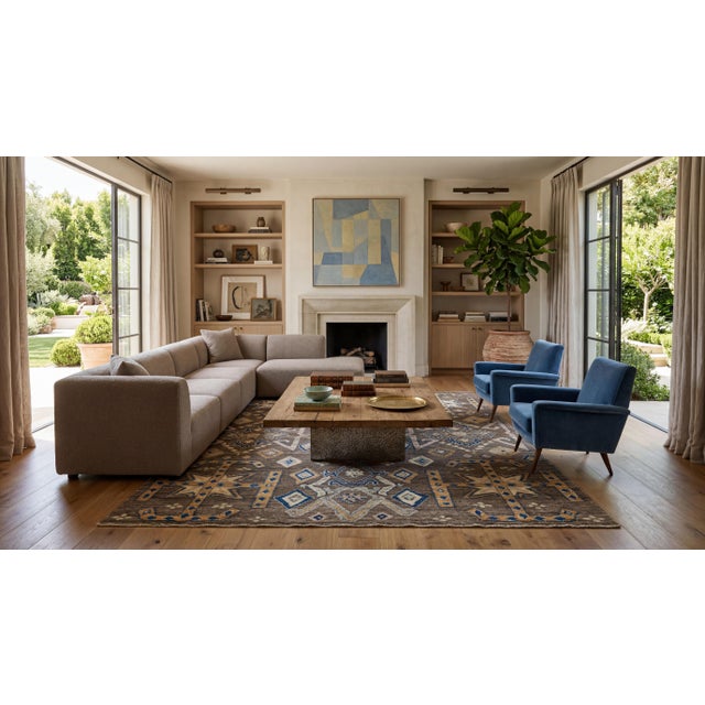 Elevate your space with this striking modern Tulu-style wool area rug, blending rich tribal heritage with a contemporary...