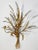 Classic large gilt metal Italian Tole sheaf of wheat wall sconce featuring two candle holders. Plumes tipped with silver....