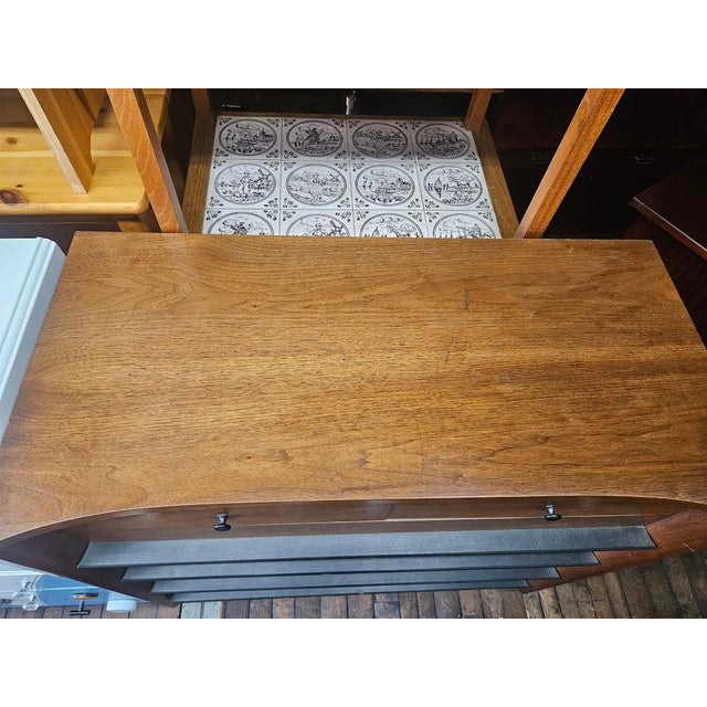 Beautiful American of Martinsville highboy dresser. It has four drawers and they function as they should. While it's in...