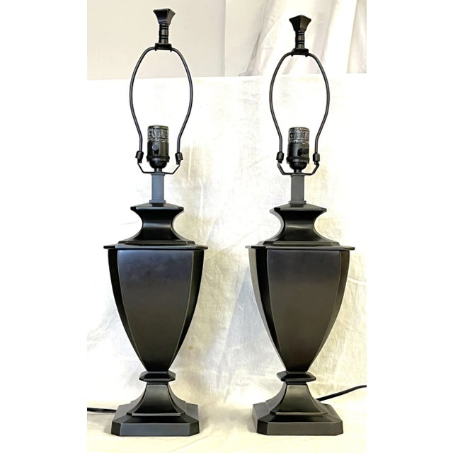 Great pair of large designer metal lamps. Each is made of heavy metal in a dark bronze, almost black finish. They have an...
