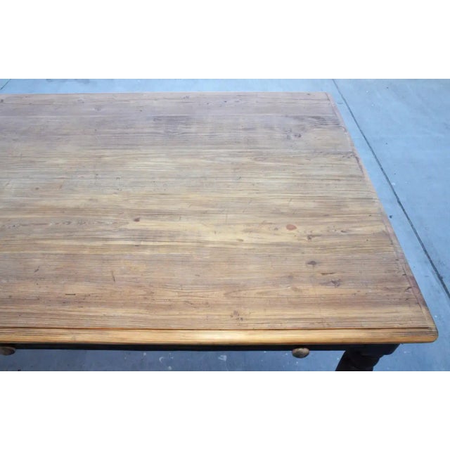 This farmhouse table is made from reclaimed pine with a painted base, turned legs and two large drawers which can be...