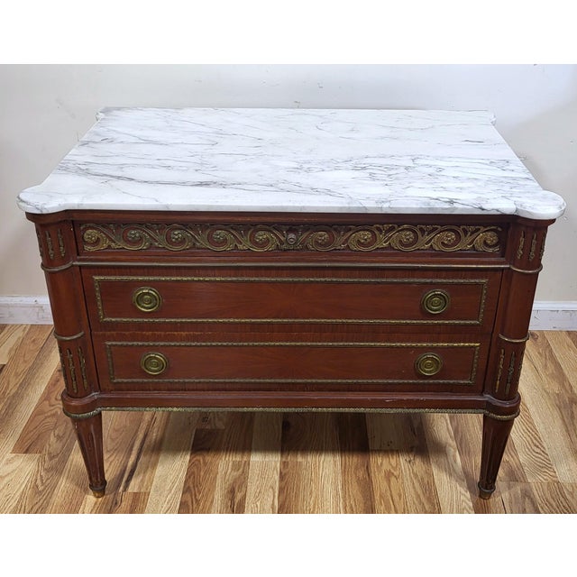 Fresh from a New York City estate, we have a pleasure to offer you this beautiful PAIR of Vintage 20th Century Marble Top...