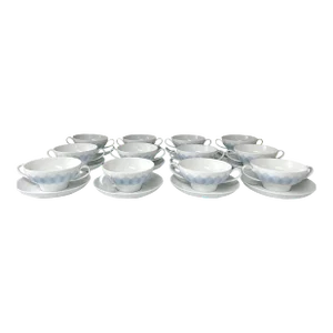 1960s Modern Bjorn Wiinblad for Rosenthal Lotus Azure Light Blue and White China Footed Cream Soup Bowls With Saucers - Service for 12