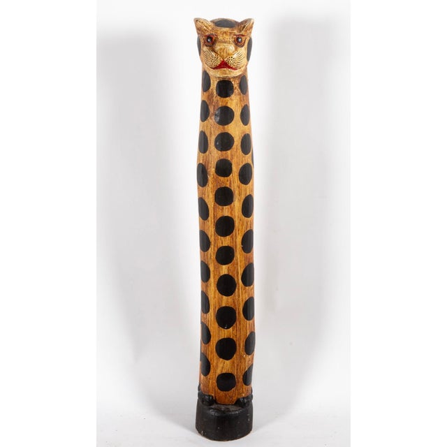 Cat lovers around the world this one’s for you! This cool cat is a tall hand-carved and painted wooden folk art leopard...