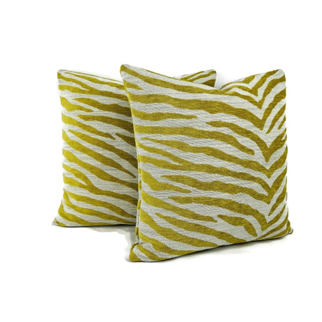From Kravet is Seonii in the color Solaria pillow cover. Fabric 32914-40. This pillow features a large-scale zebra print...