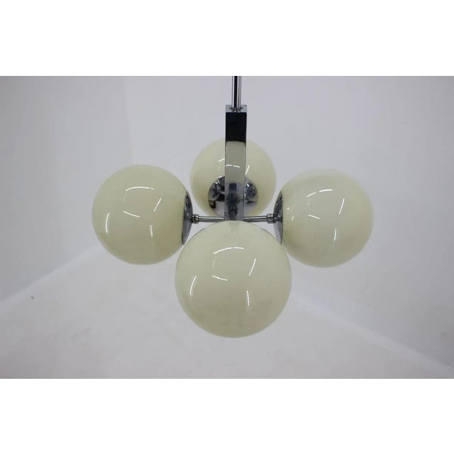 - Bauhaus, functionalism, circa 1930s. - Completely original condition - Clean and simple lines - Original opaline glasses...