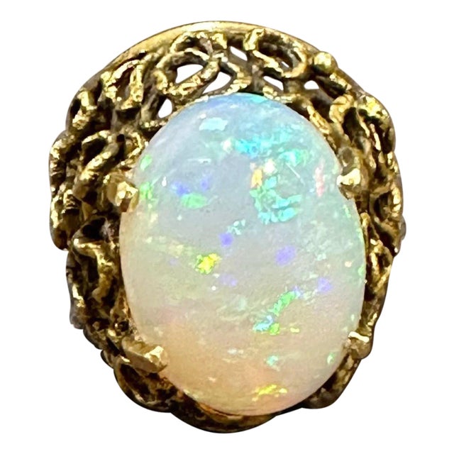 Vintage 11 Carat Oval Shape Ethiopian Opal Cocktail Ring 14kt Yellow Gold Ring For Sale