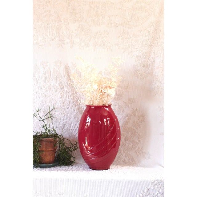 An extra large lipstick red vase in an Art Deco fan style from the 1980s. Has a great scalloped or large ribbed design....