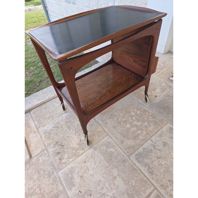 Great mid century modern trolley bar cart with optional bottle caddy.