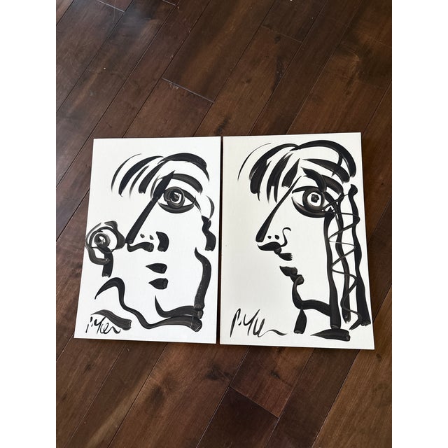 Great pair of original paintings by Peter Keil. Each are on hard painters board and depict cubist abstract profiles in...