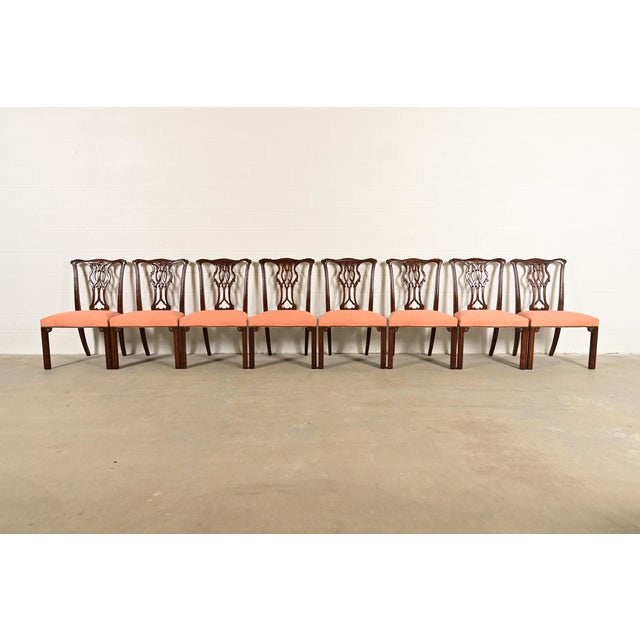 An outstanding set of eight Georgian or Chippendale style dining chairs By Baker Furniture USA, Circa 1980s Carved solid...
