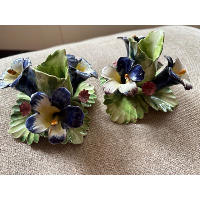 I love the intricate, hand-applied "3D" floral work is typical of the Capodimonte style, offering a lush, botanical feel...