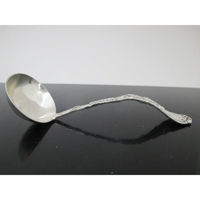 Antique sterling silver Durgin ladle in the Louis XV pattern, c1891. Measures 6 3/4". Excellent condition, monogram on...