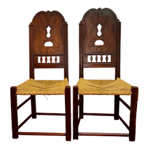 Pair of Early 1900s Horse Head Oak Chairs With Rush Seats Styled After Worpsweder Heinrich Voegeler