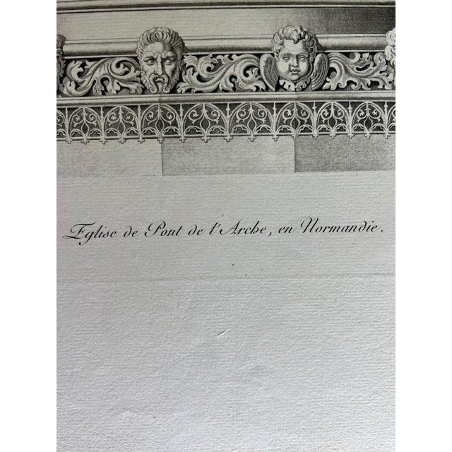 This is an etching reproduction of a piece depicting decorative crowning elements in a church in Normandie, France. This...
