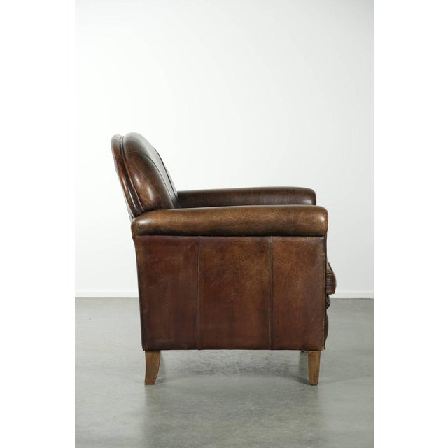 We are offering this timeless, luxurious, and characterful sheepskin design armchair with a beautiful patina. This...