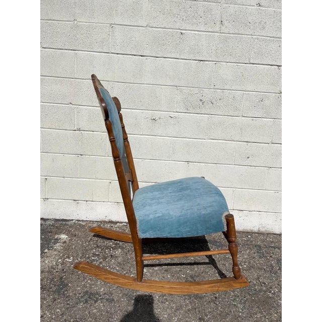 Wonderful antique rocking chair with lots of charm and character. Features a traditional hand turned spindles and adorable...