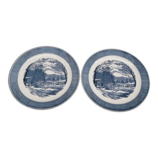 Mid 20th Century Mid-Century Modern Currier and Ives Large Blue Chop Plates Getting Ice Pattern - a Pair For Sale