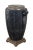 Vintage composite / resin floor vase in the shape of a trophy urn on a light bronze colored, square, tiered base and...