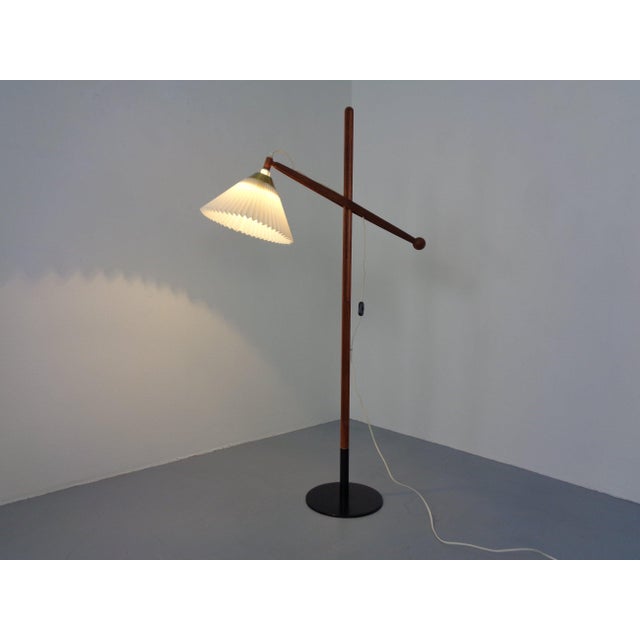 Height- and angle-adjustable floor lamp by Le Klint from the 1960s. Model 325. Marked with a sticker on the underside....
