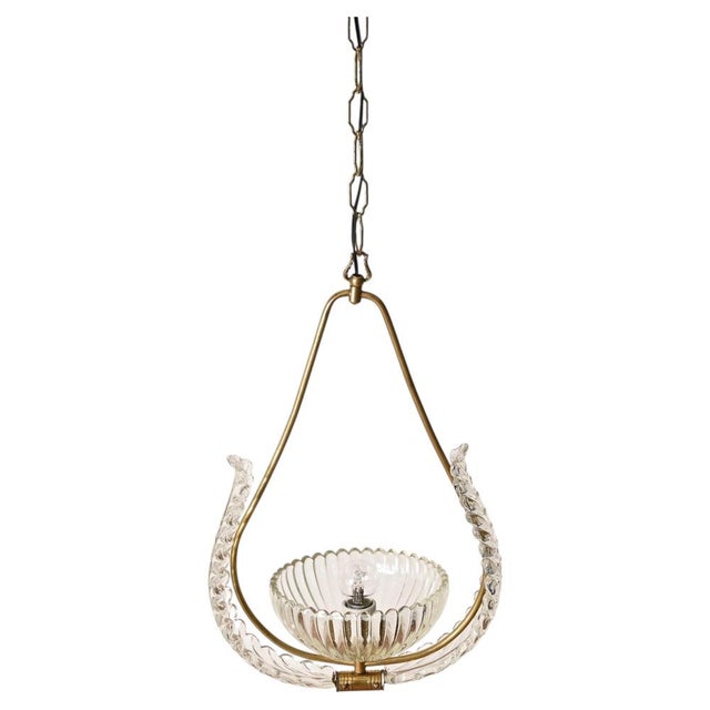Spectacular floral pendant in murano mouth-blown glass and brass. This incredibly elegant and unique chandelier was...