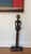 Vintage hand carved wood sculpture of an elongated woman figure, possibly of African origin. Lighter facial features and a...