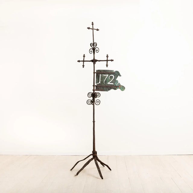 Unique antique weather vane in handwrought iron. The weather vane is dated ‘1725’ and the plaque with the dating is made...